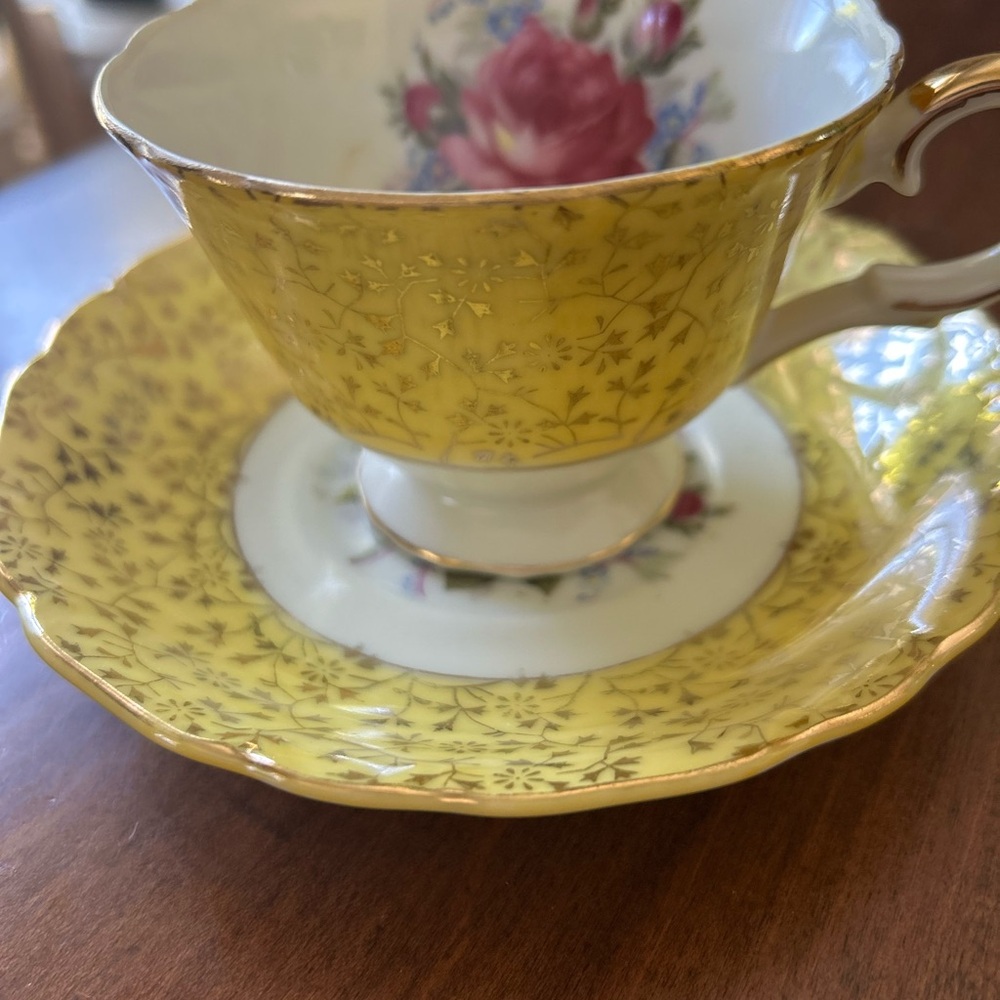 Elegant Yellow Floral Teacup and Saucer